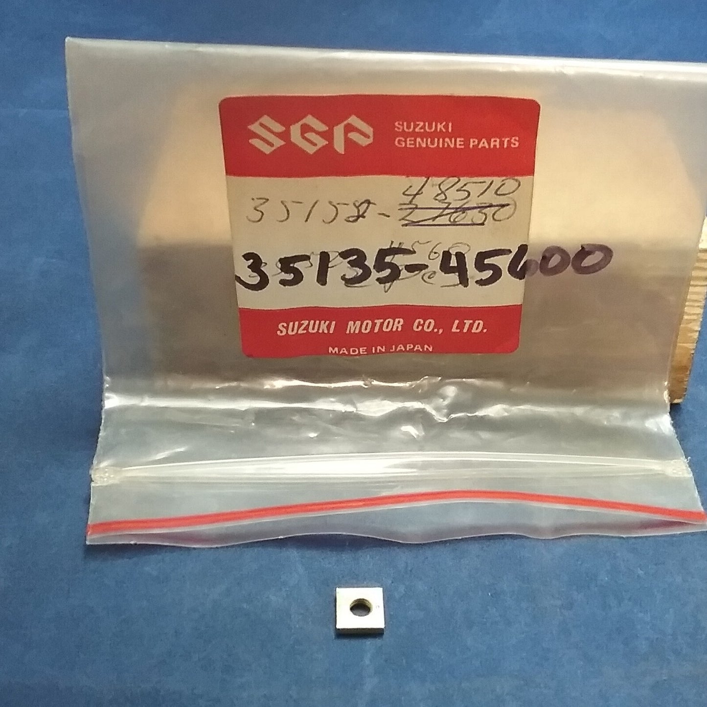 NEW GENUINE SUZUKI 35135-45600 NUT, HEADLAMP GT250 RV125 TS185 TS250 TS400