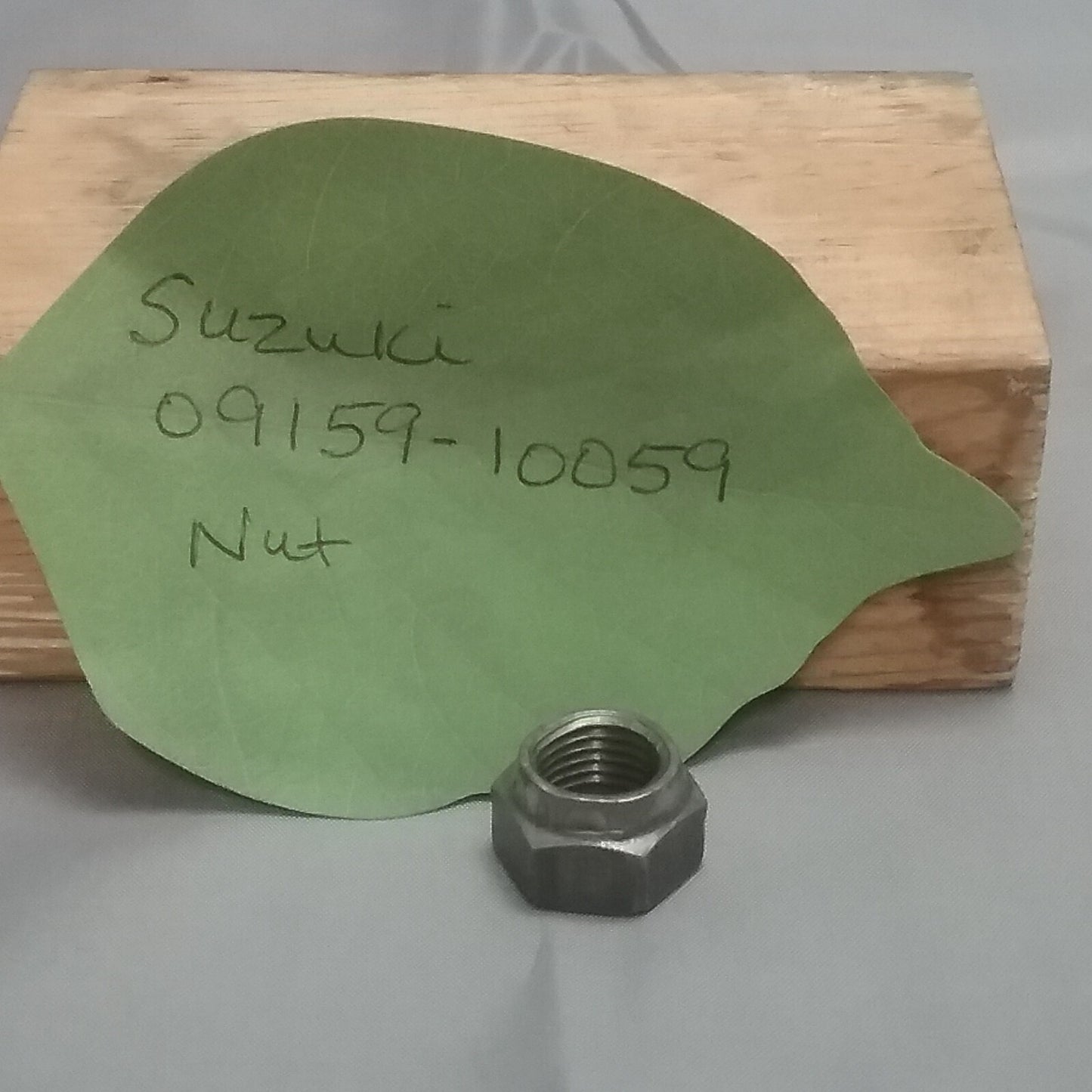 NEW REPLACES SUZUKI 09159-10059 NUT, FRONT 1986-2009