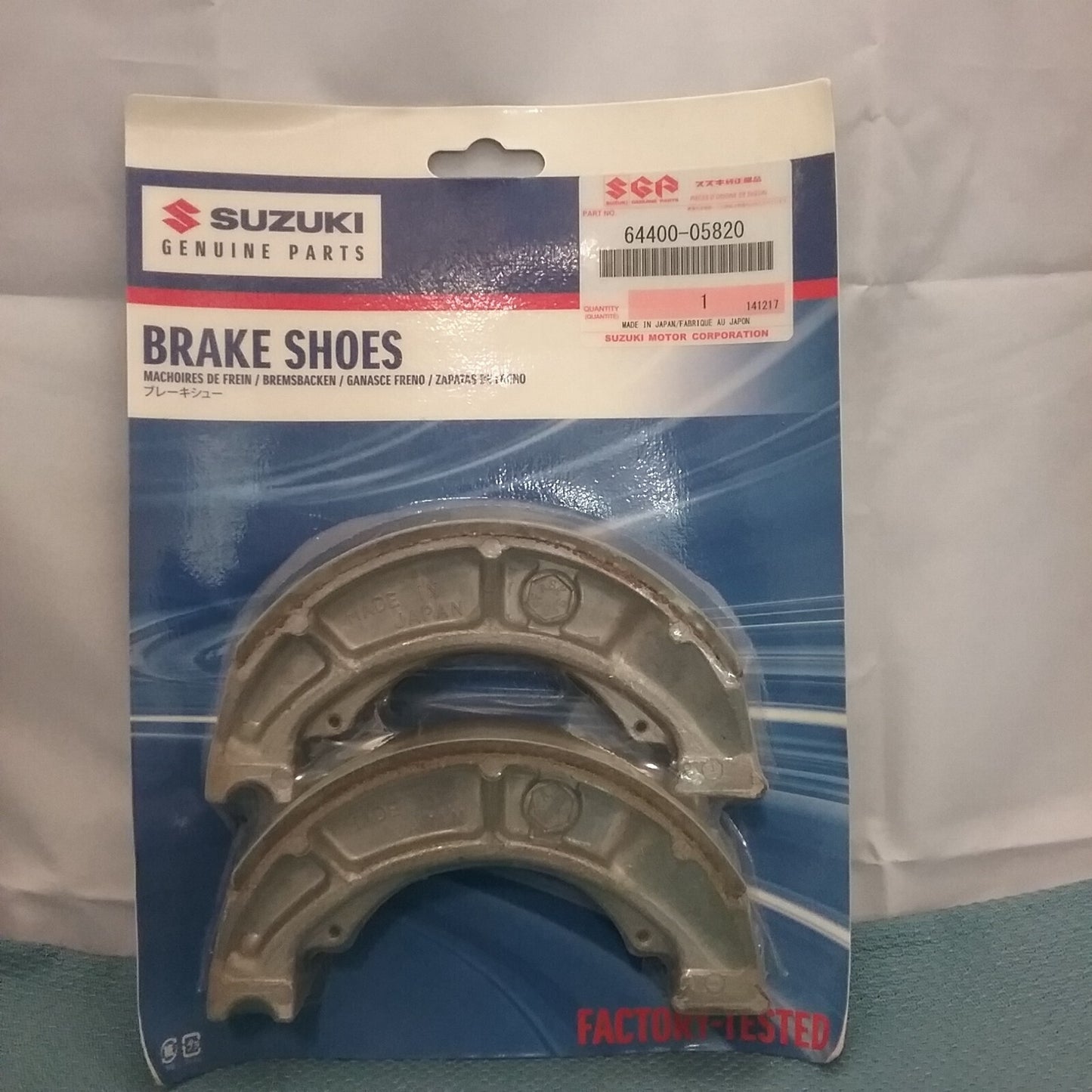 NEW GENUINE SUZUKI 64400-05820 SHOE SET, BRAKE 2004-2009
