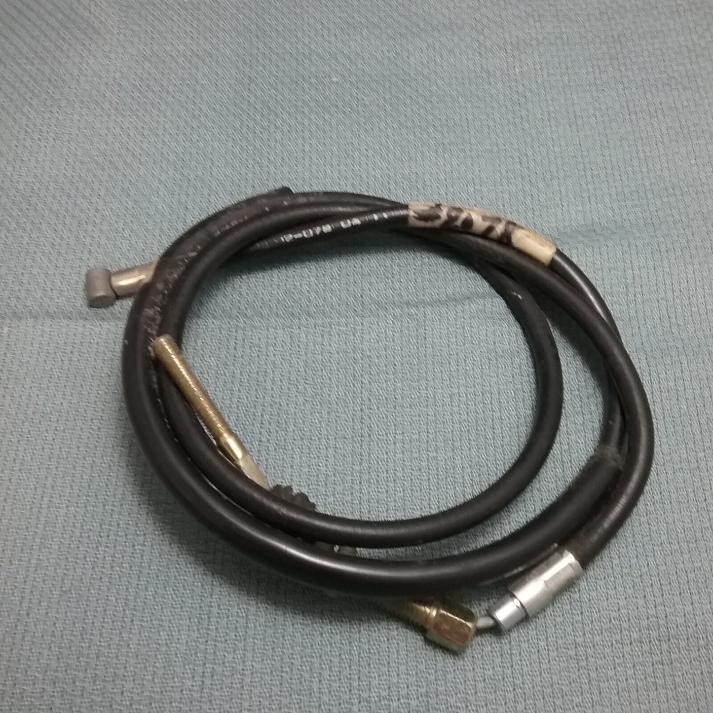 NEW MOTION PRO 02-078 BLACK VINYL REAR HAND BRAKE CABLE