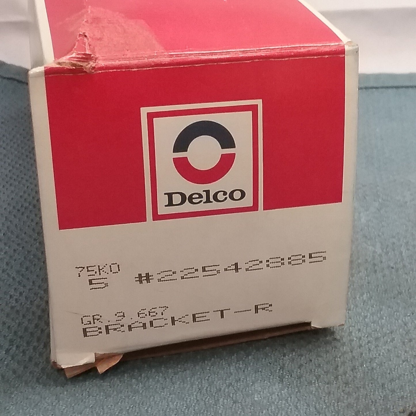 ACDELCO 22542885 BRACKET RADIO, REAR FOR GM