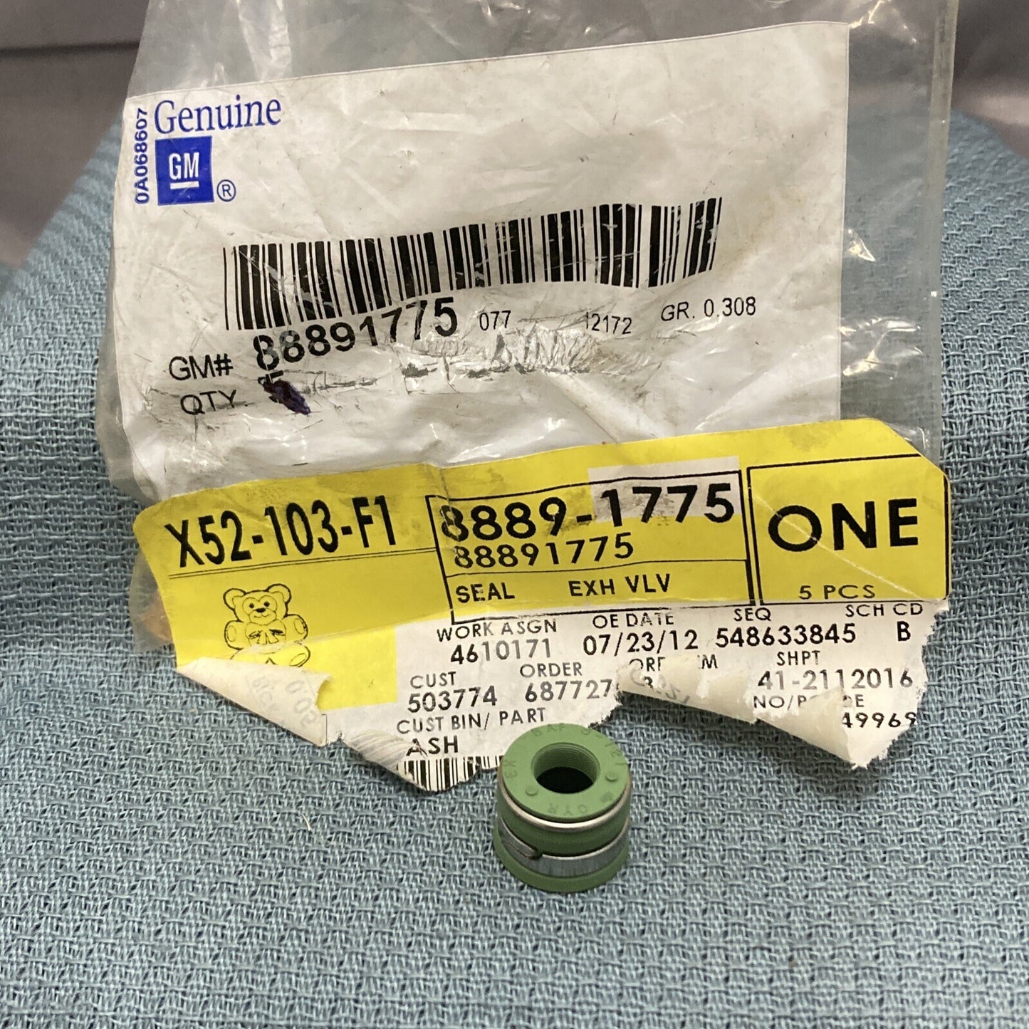 NEW GENUINE GM 88891775 SEAL ASM, EXHAUST VALVE STEM OIL GR 0.308