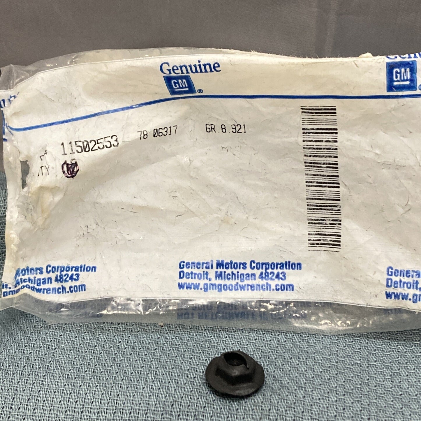 NEW GENUINE GM 11502553 NUT, SELF-THREAD W/SEAL GR 8.921