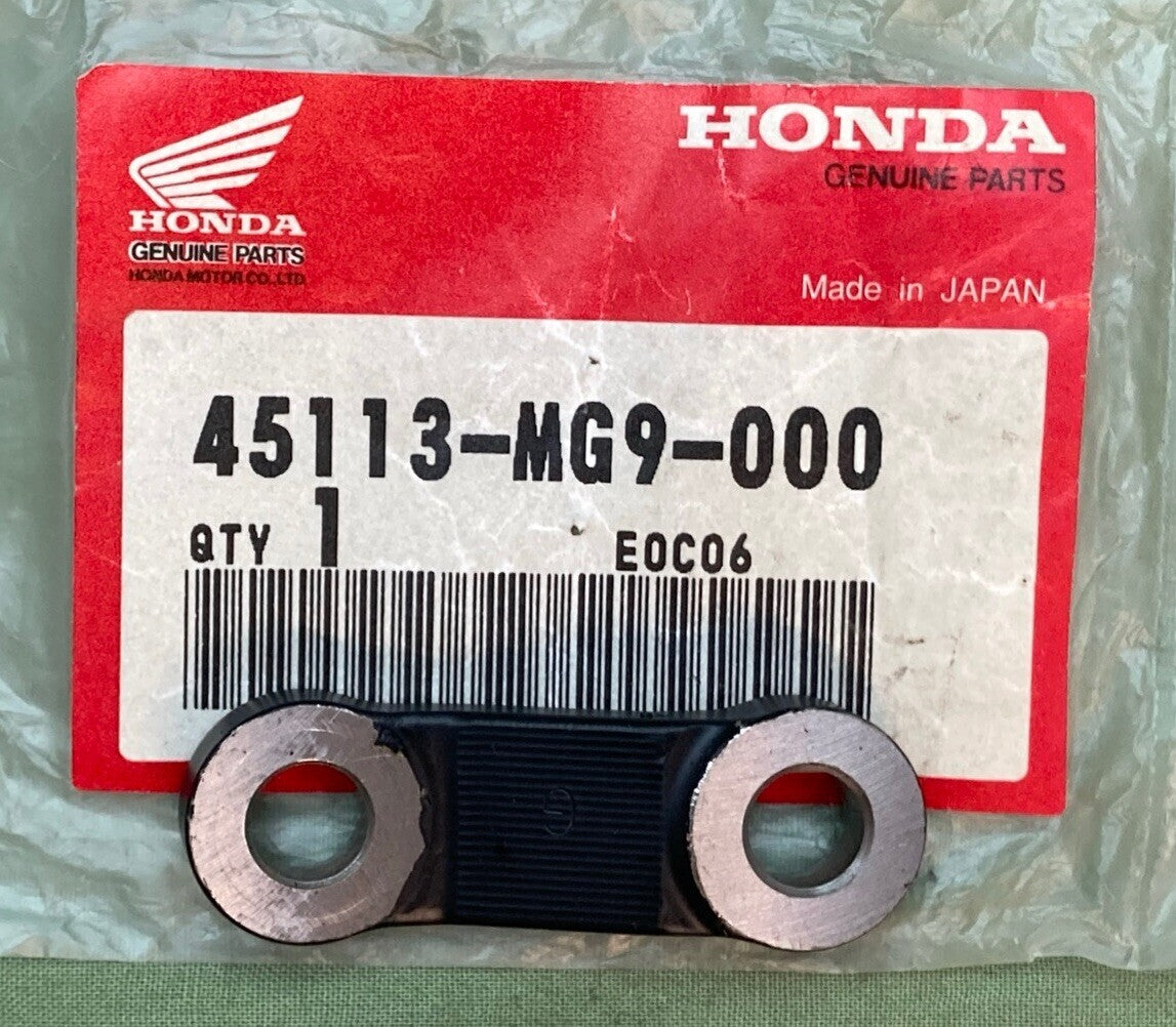 NEW GENUINE HONDA 45113-MG9-000 BRIDGE, CALIPER BRACKET