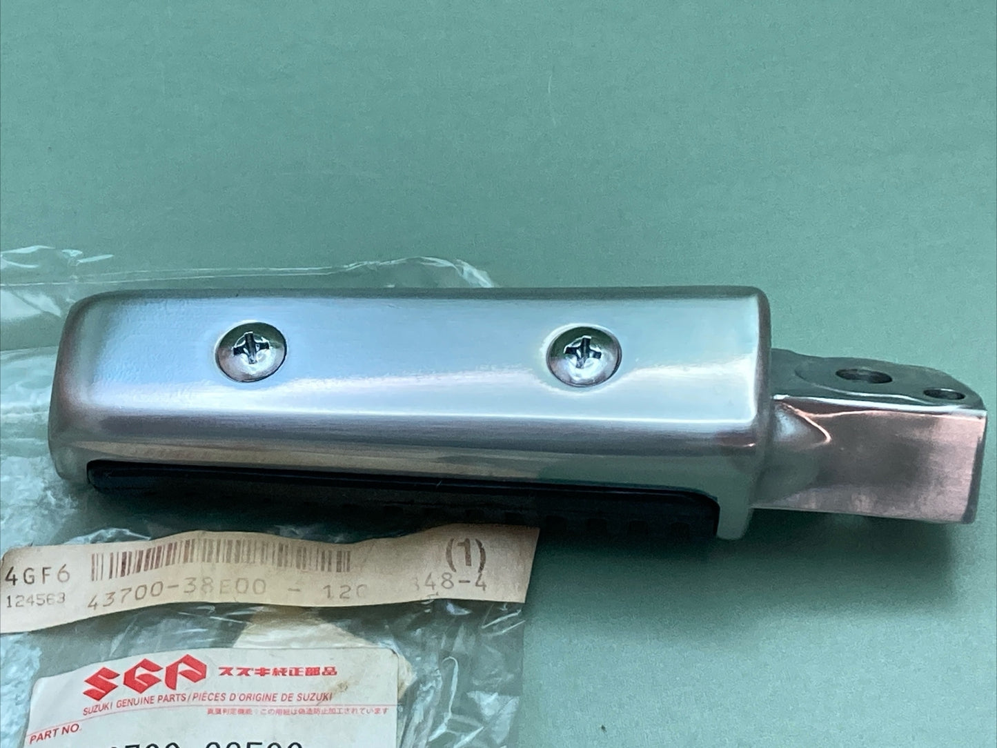 NEW GENUINE SUZUKI 43700-38E00 FOOTREST ASSEMBLY, PILLION LH