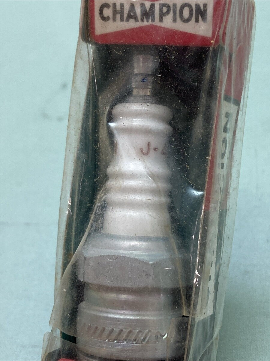 NEW GENUINE CHAMPION J-4 SPARK PLUG