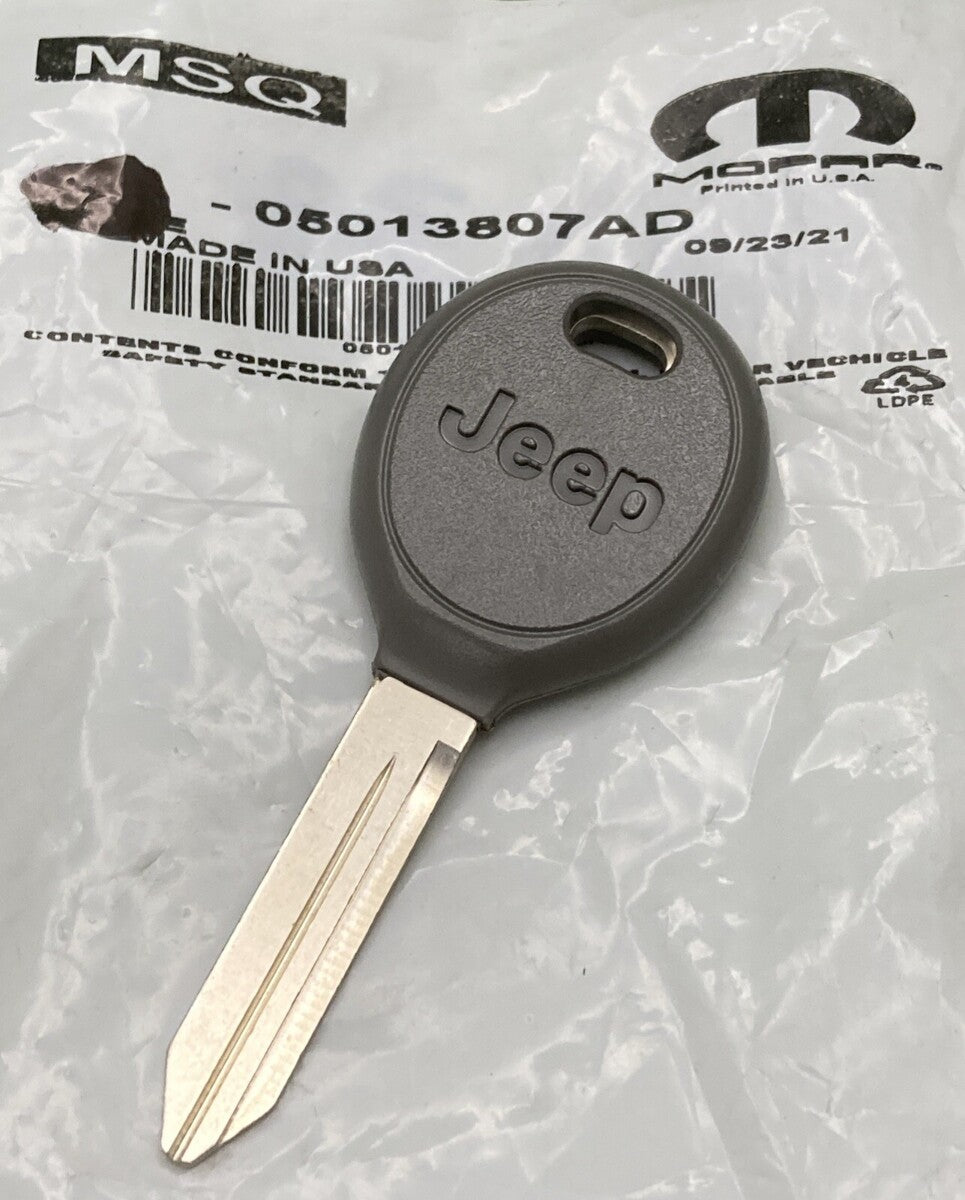 NEW GENUINE MOPAR 05013807AD Key