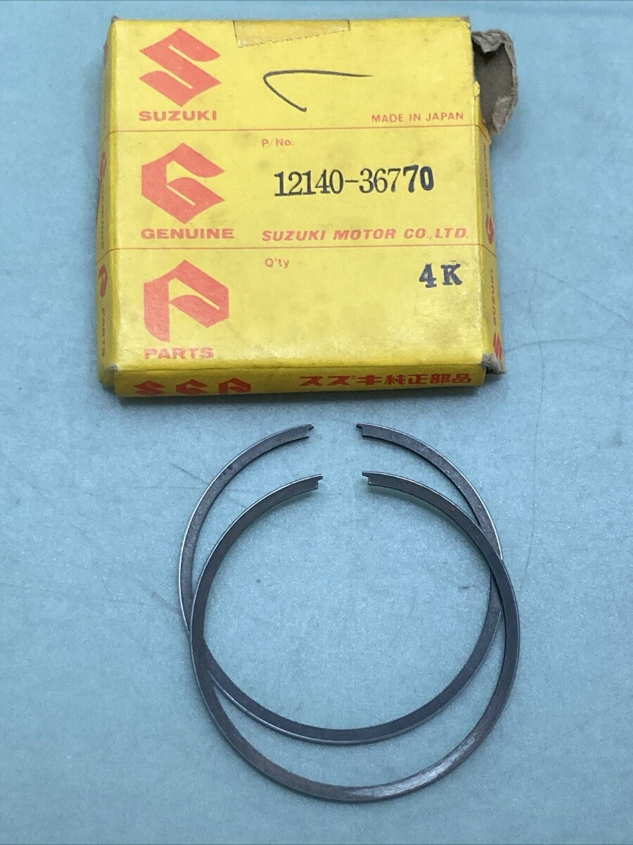 NEW GENUINE SUZUKI 12140-36770 PISTON RING SET 0.50 O/S