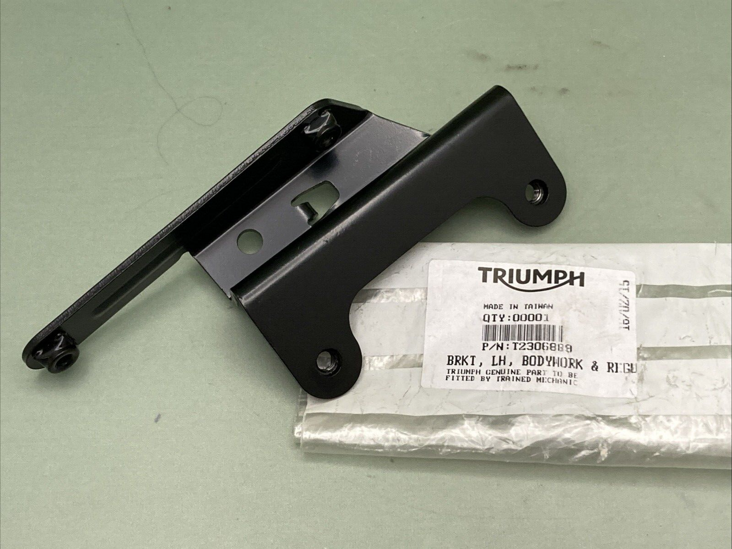 NEW GENUINE TRIUMPH T2306889 Brkt, Lh, Bodywork & Regulator
