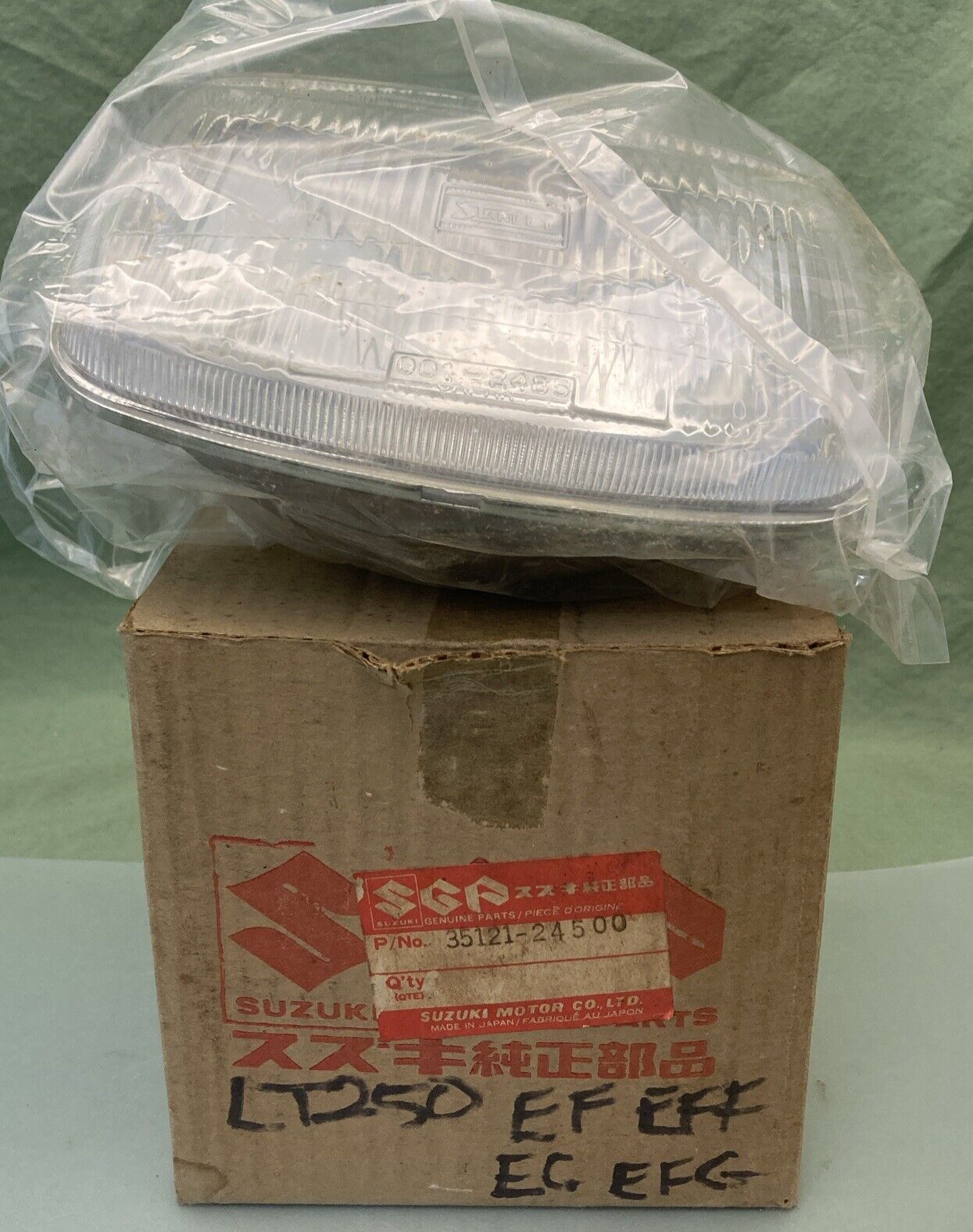 NEW GENUINE SUZUKI 35121-24500 HEADLIGHT LENS