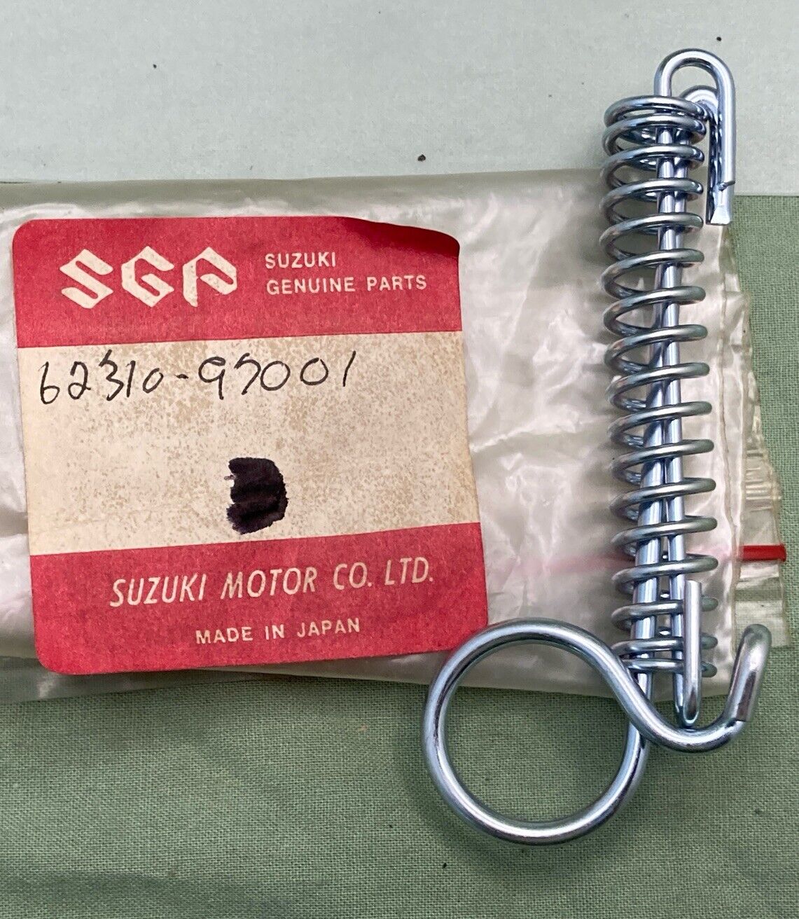NEW GENUINE SUZUKI 62310-97001 SPRING, STAND - FOOTREST