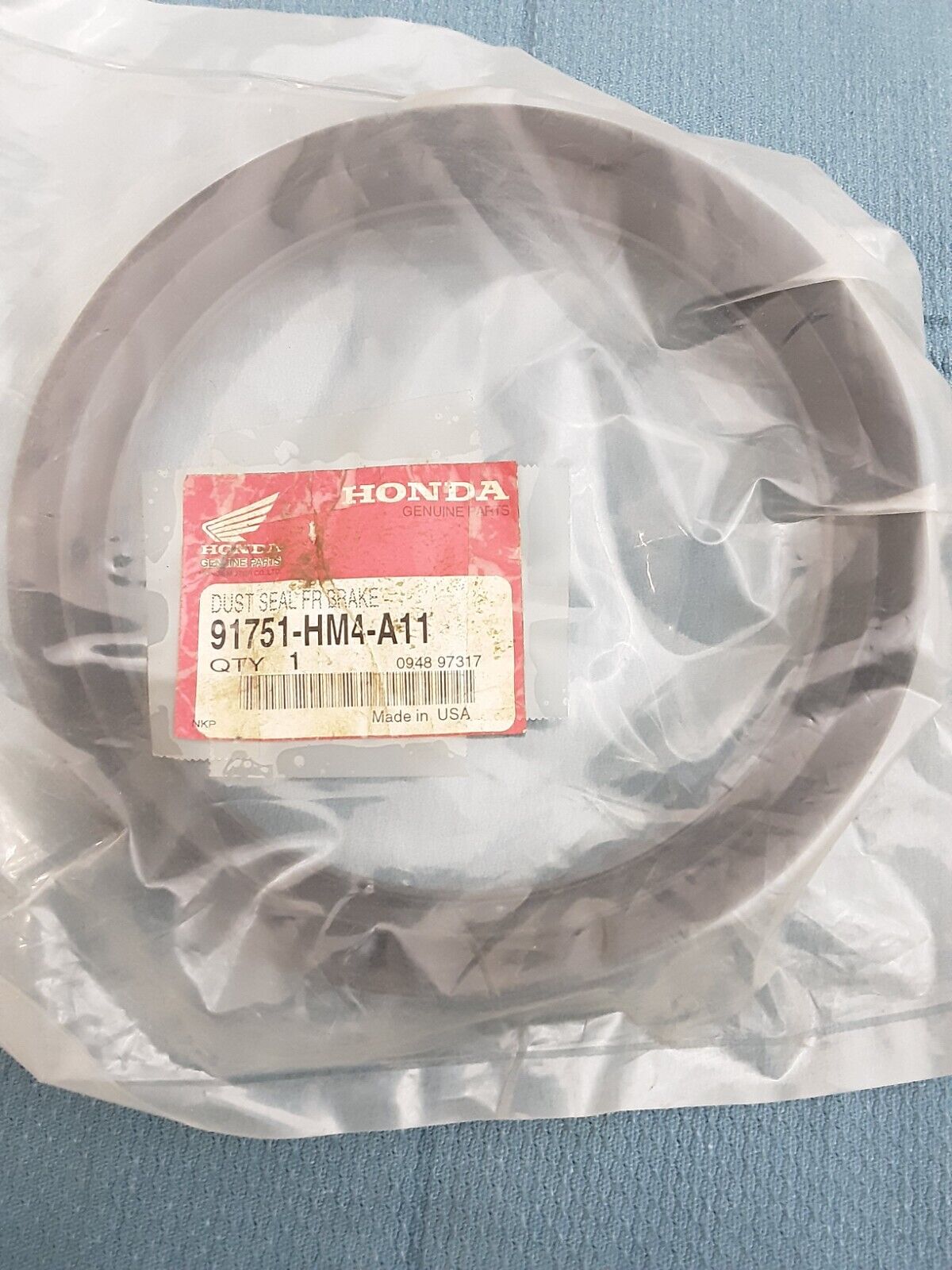 NEW HONDA 91751-HM4-A11 DUST SEAL, FR. BRAKE FOURTRAX TRX300 1998-2000