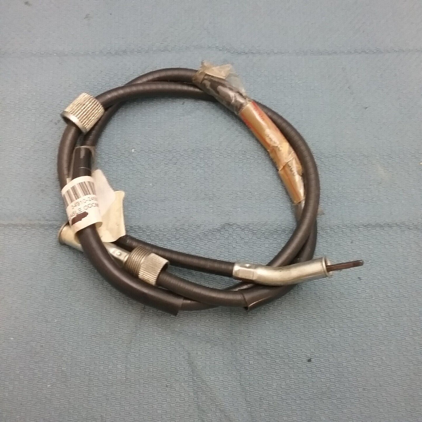 NEW GENUINE SUZUKI 34910-24500 CABLE ASSEMBLY, ODOMETER LT250 1985-1986