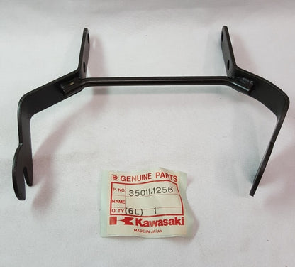 NEW GENUINE KAWASAKI 35011-1256 STAY, HEAD LAMP Bayou KLF300-A1 1986