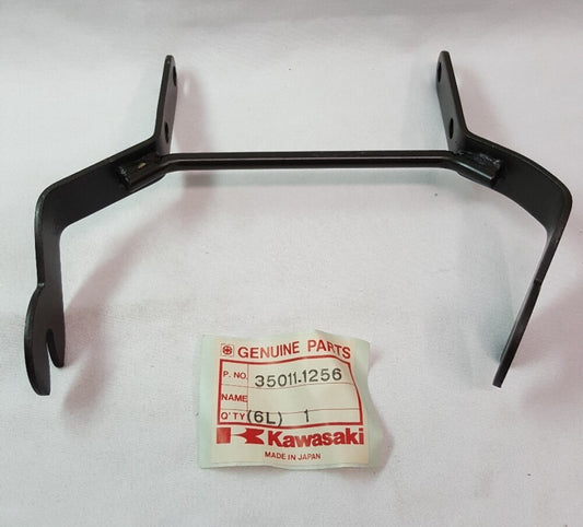 NEW GENUINE KAWASAKI 35011-1256 STAY, HEAD LAMP Bayou KLF300-A1 1986
