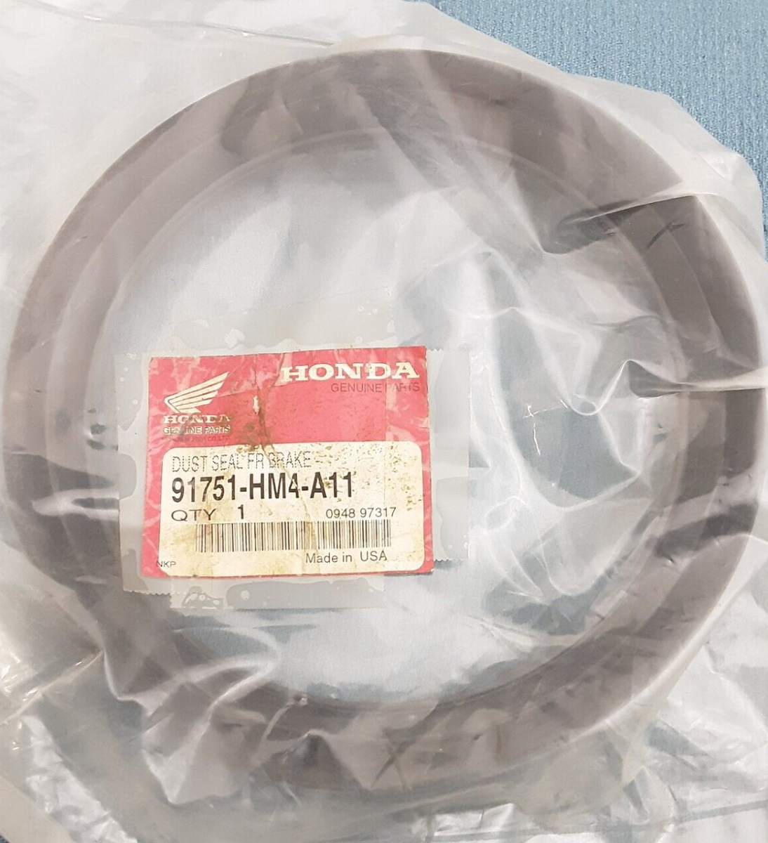 NEW HONDA 91751-HM4-A11 DUST SEAL, FR. BRAKE FOURTRAX TRX300 1998-2000