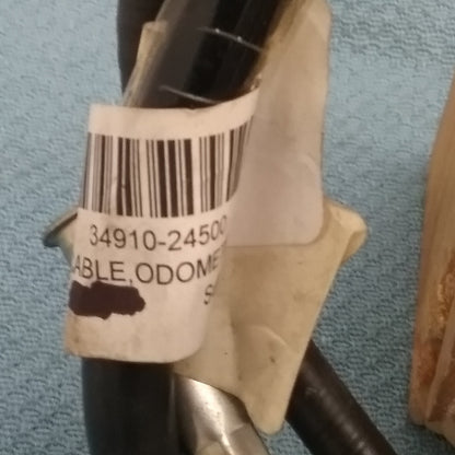 NEW GENUINE SUZUKI 34910-24500 CABLE ASSEMBLY, ODOMETER LT250 1985-1986