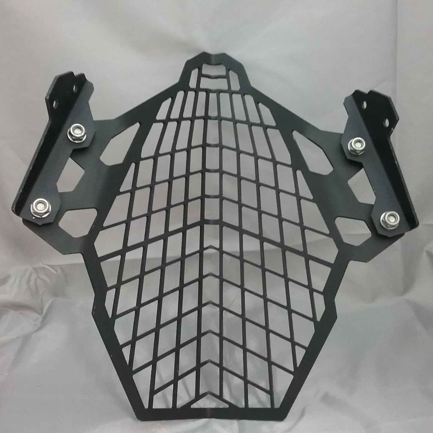 TOURATECH Stainless steel black headlight protector with quick release brackets.