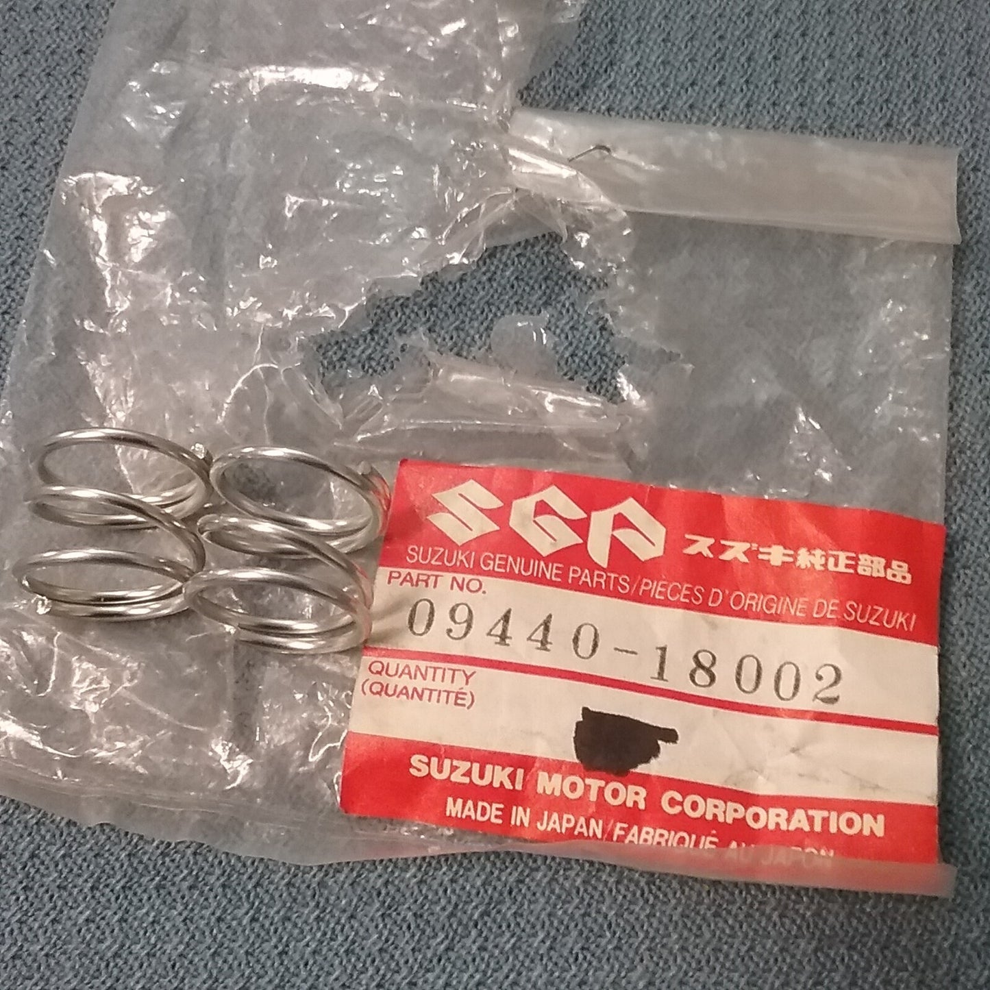QTY 4 NEW GENIUNE SUZUKI 09440-18002 REAR SWINGING ARM SPRING T10