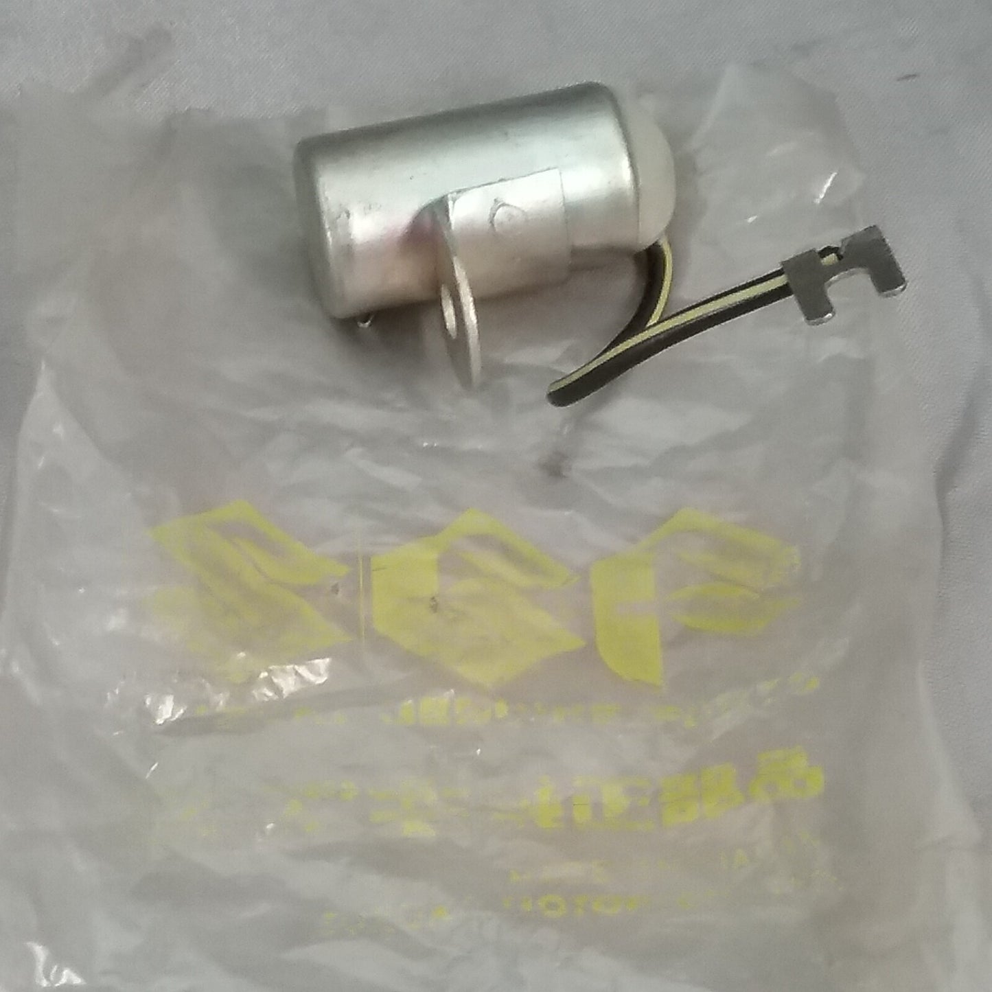 NEW SUZUKI 32341-34020I CONDENSER, LH GT550 1972