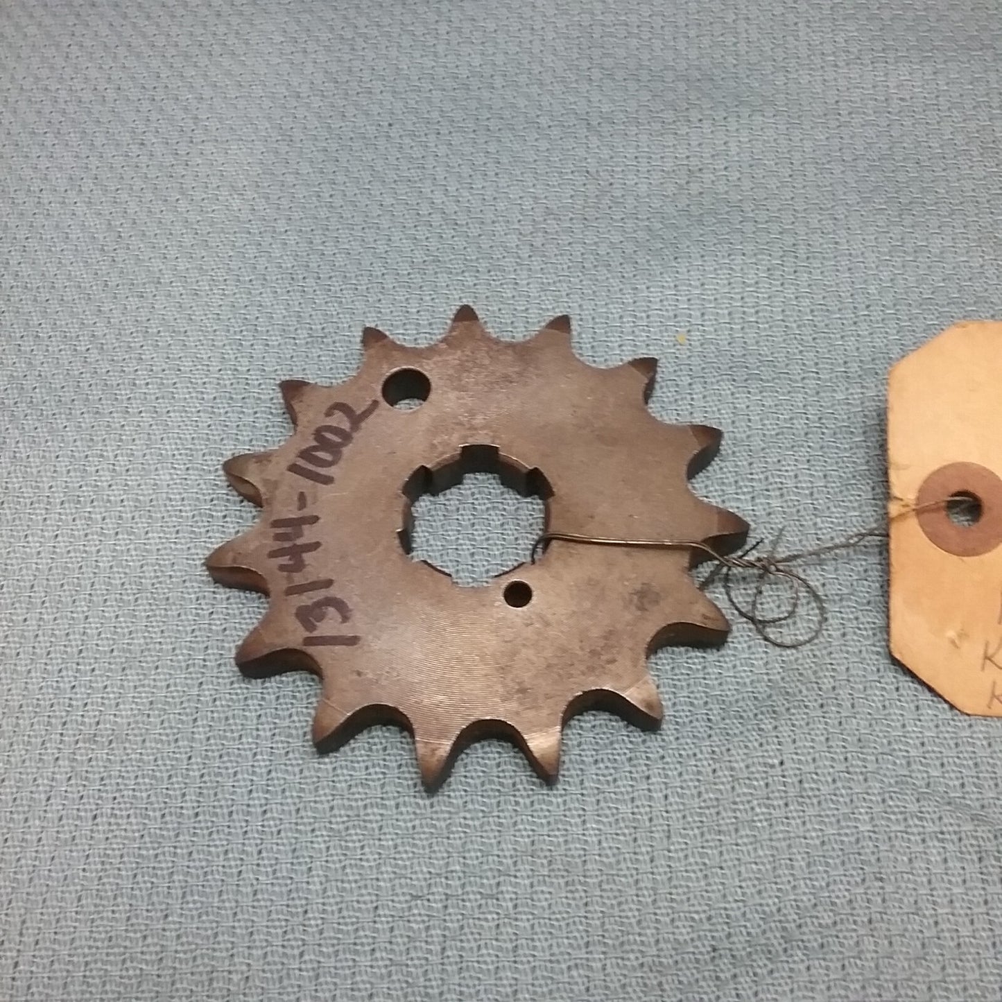 NEW KAWASAKI 13144-1002 ENGINE SPROCKET, 15T