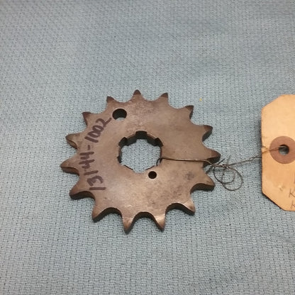 NEW KAWASAKI 13144-1002 ENGINE SPROCKET, 15T