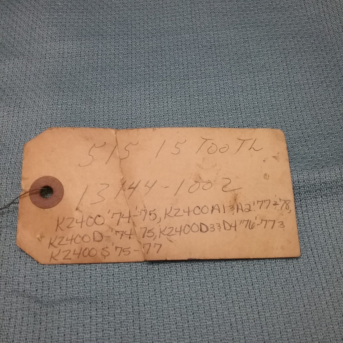 NEW KAWASAKI 13144-1002 ENGINE SPROCKET, 15T