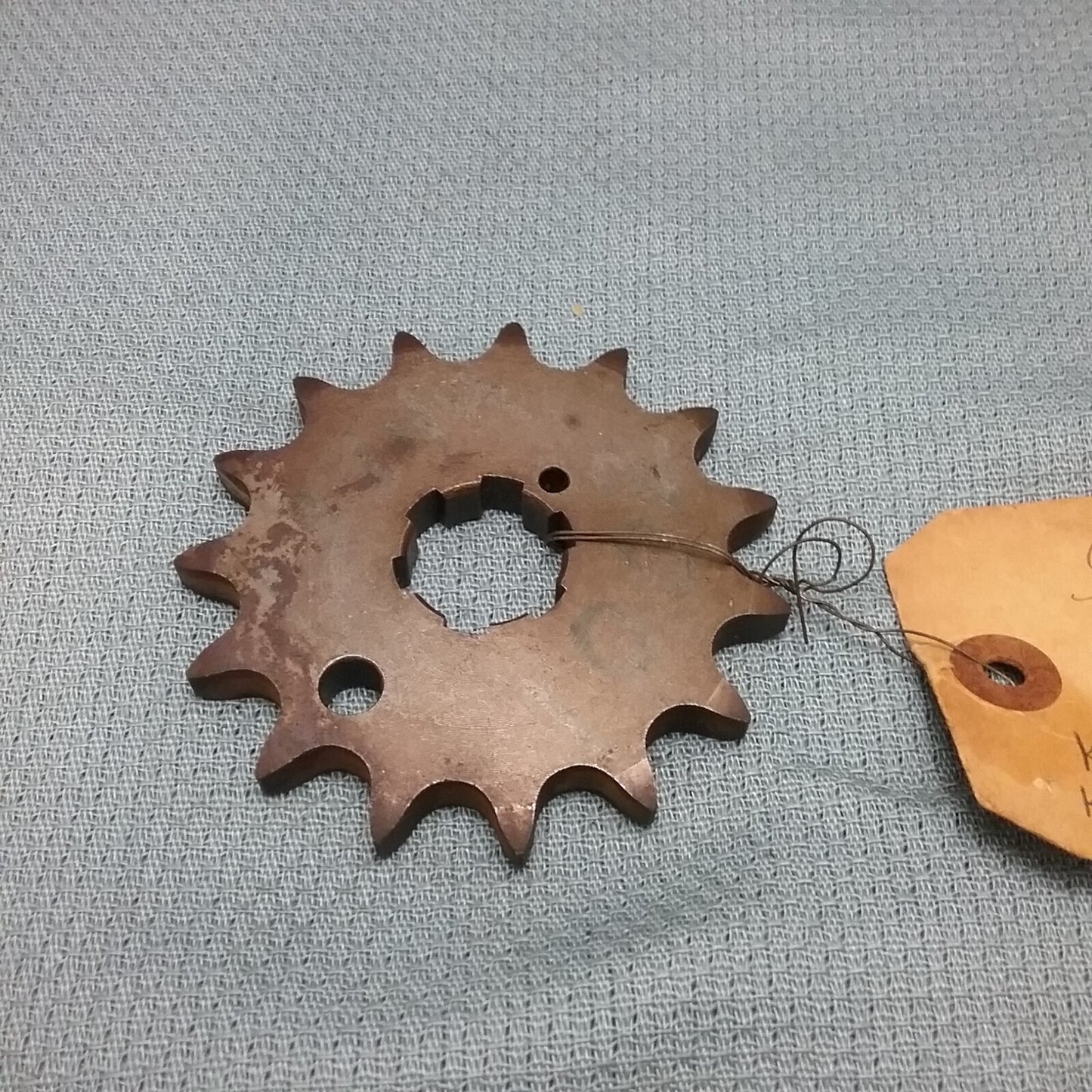 NEW KAWASAKI 13144-1002 ENGINE SPROCKET, 15T
