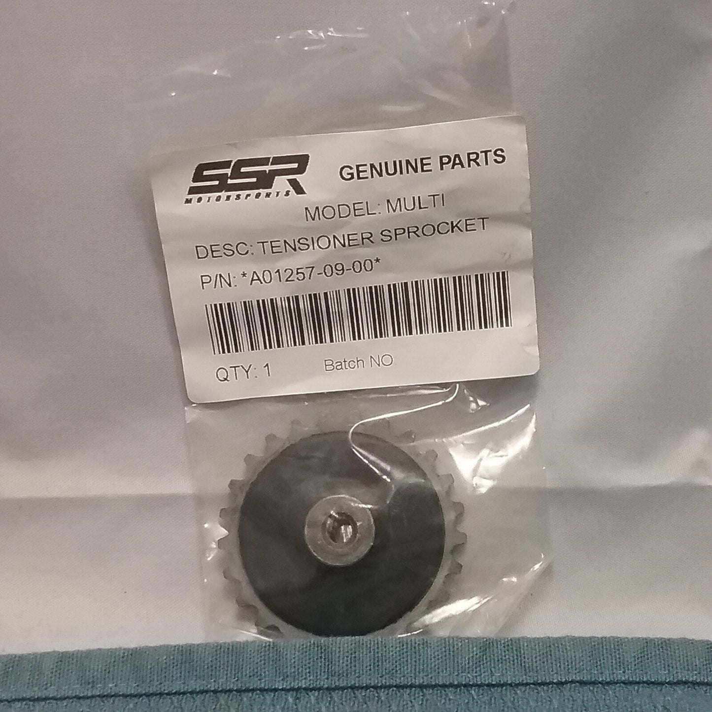 NEW SSR A01257-09-00 TENSIONER SPROCKET