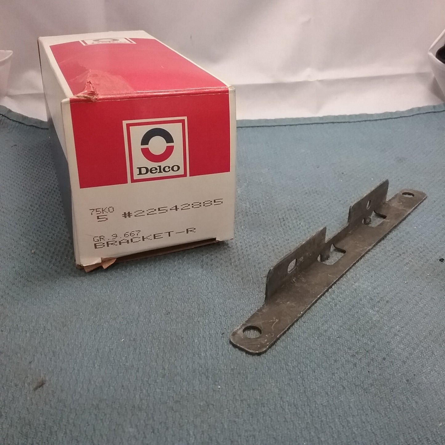 ACDELCO 22542885 BRACKET RADIO, REAR FOR GM