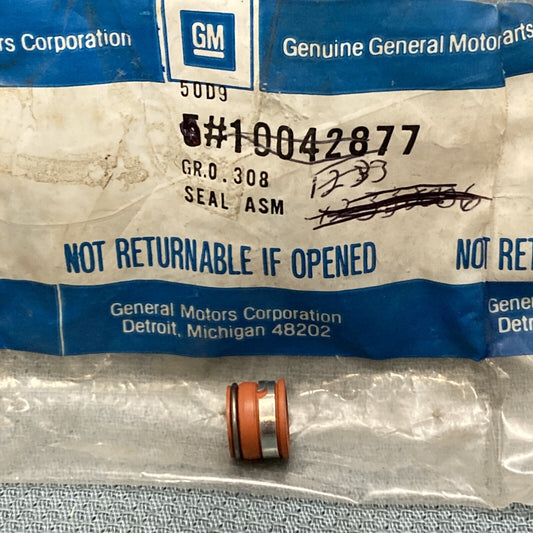 NEW GENUINE GM 10042877 SEAL ASSEMBLY, EXHAUST VALVE STEM OIL 1987-1993 GR 0.308