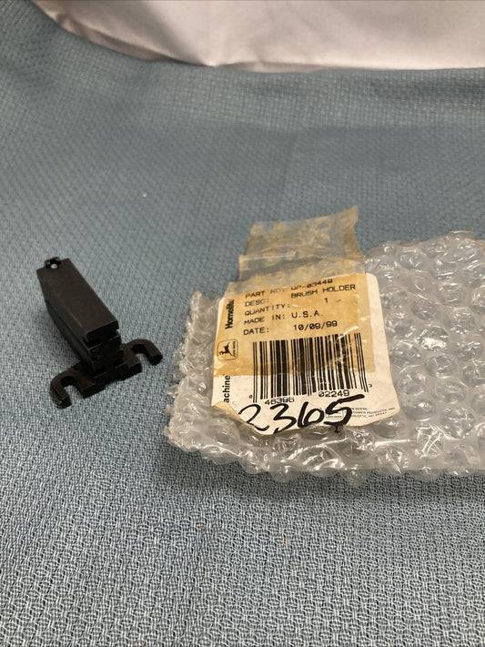 NEW GENUINE JOHN DEERE/GREEN MACHINE, HOMELITE UP-03449 BRUSH HOLDER