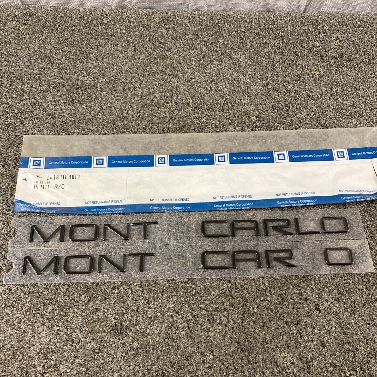NEW GM 10189883, PLATE KIT, REAR QUARTER NAME *BLACK (MONTE CARLO) PARTIAL KIT