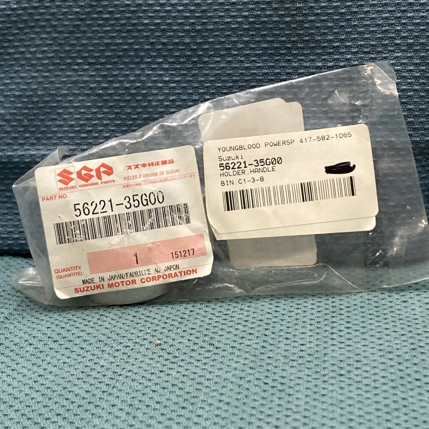 NEW GENIUNE SUZUKI 56221-35G00 HOLDER, HANDLE LOWER