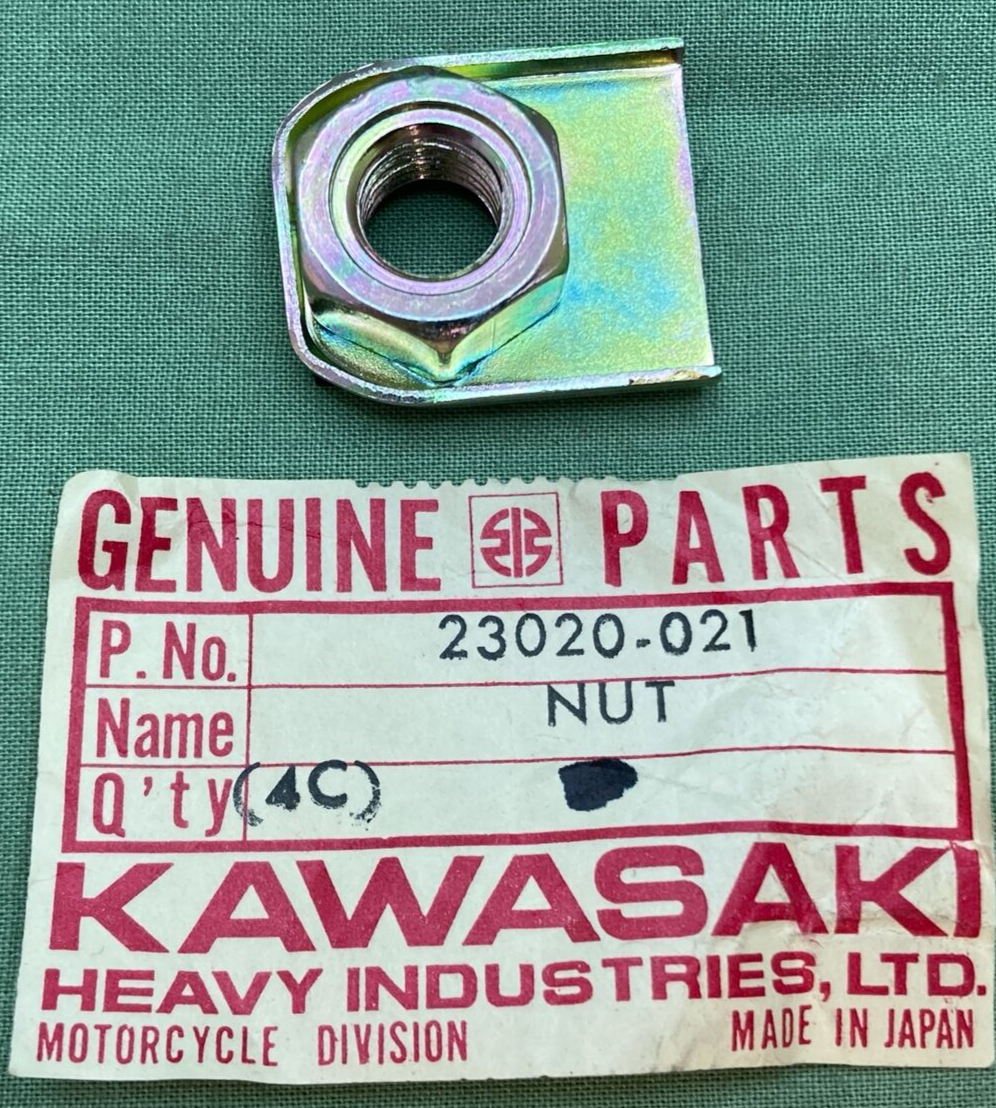 QTY 2 NEW GENUINE KAWASAKI 23020-021 NUT 10MM, HEADLIGHT