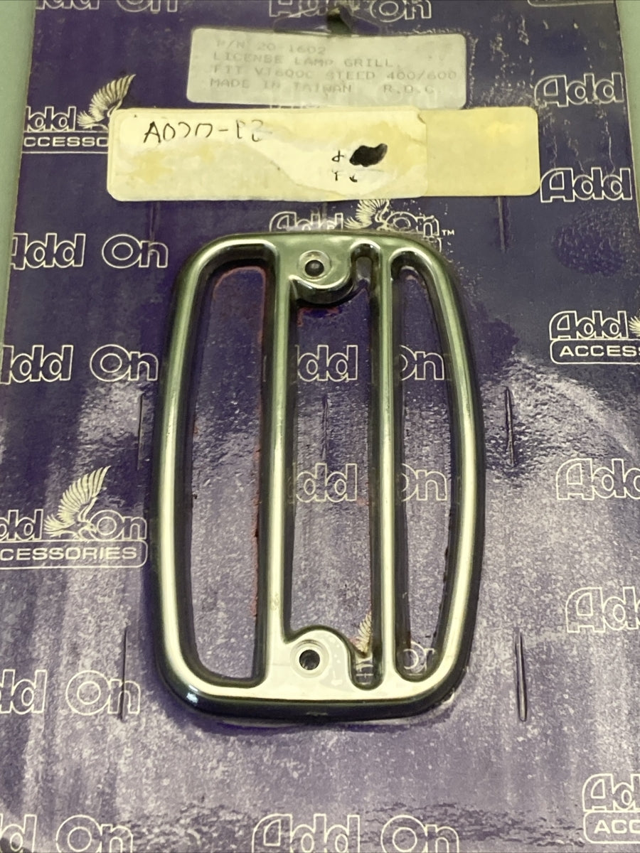 NEW GENUINE ADD ON 20-1602 LICENSE LAMP GRILL FIT VT600C STEED 400/600
