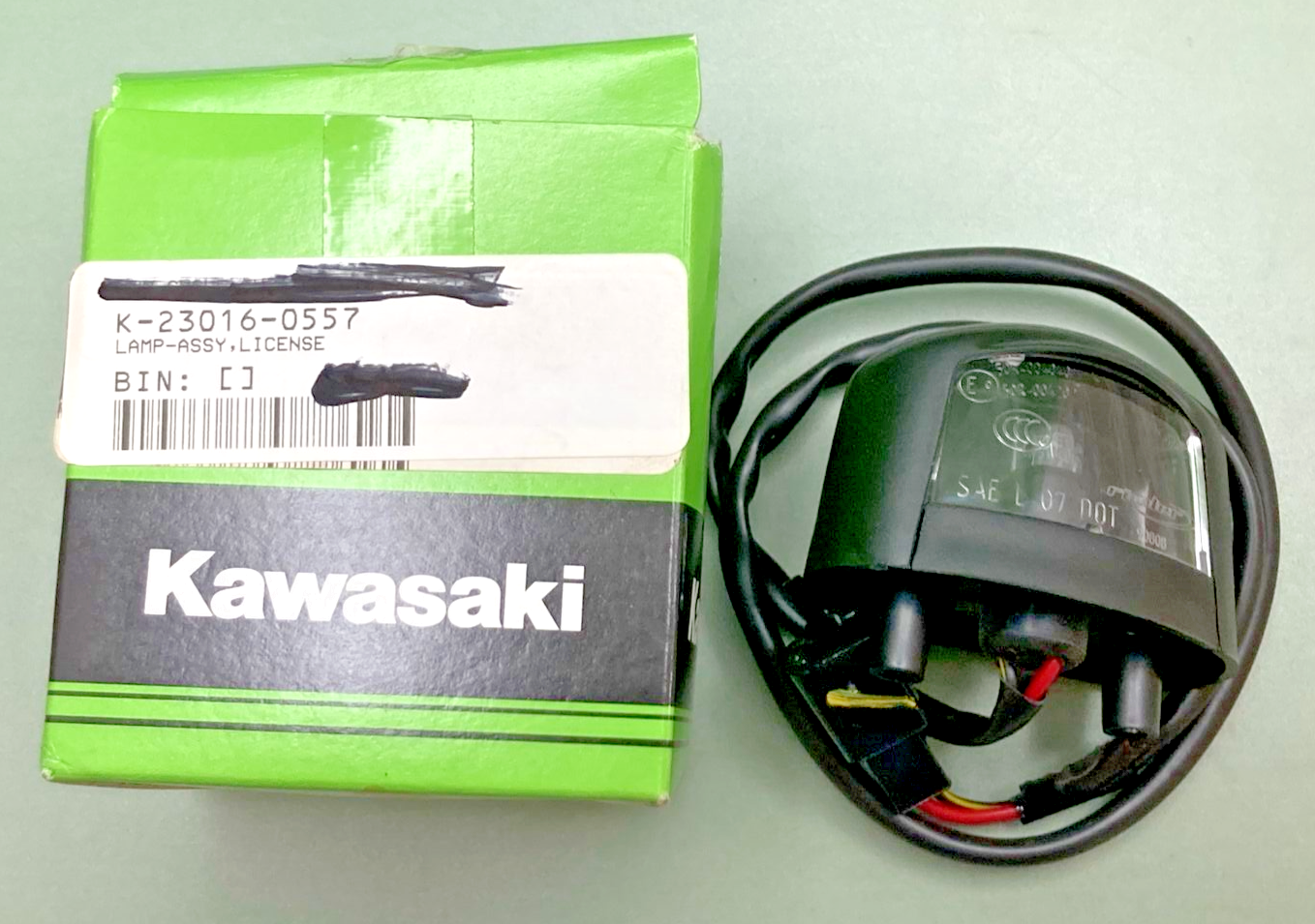 NEW GENUINE KAWASAKI 23016-0557 LAMP ASSEMBLY LICENSE