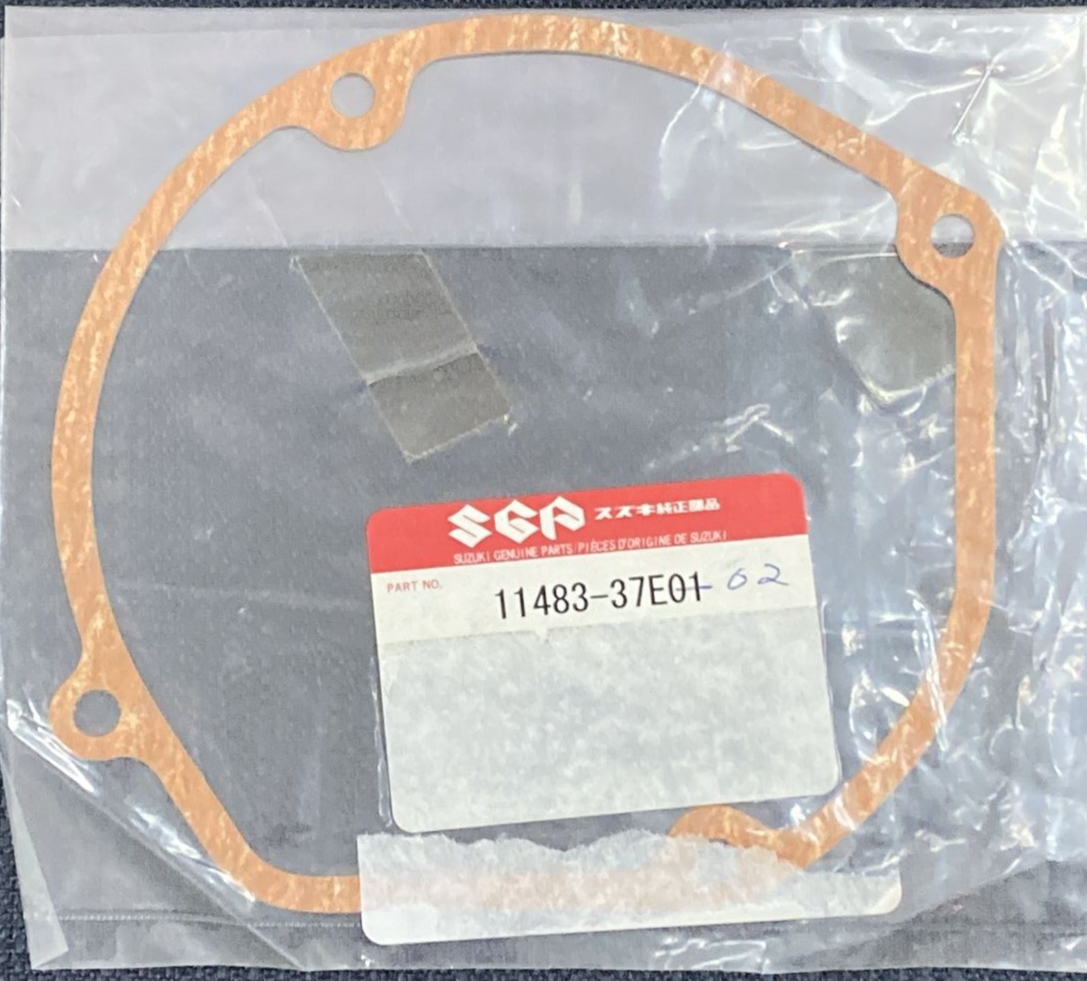 NEW GENUINE SUZUKI 11483-37E01 MAGNETO GASKET CRANKCASE WATER PUMP   RM250