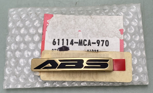 NEW GENUINE HONDA 61114-MCA-970 FRONT FENDER Emblem, L. (TYPE1)