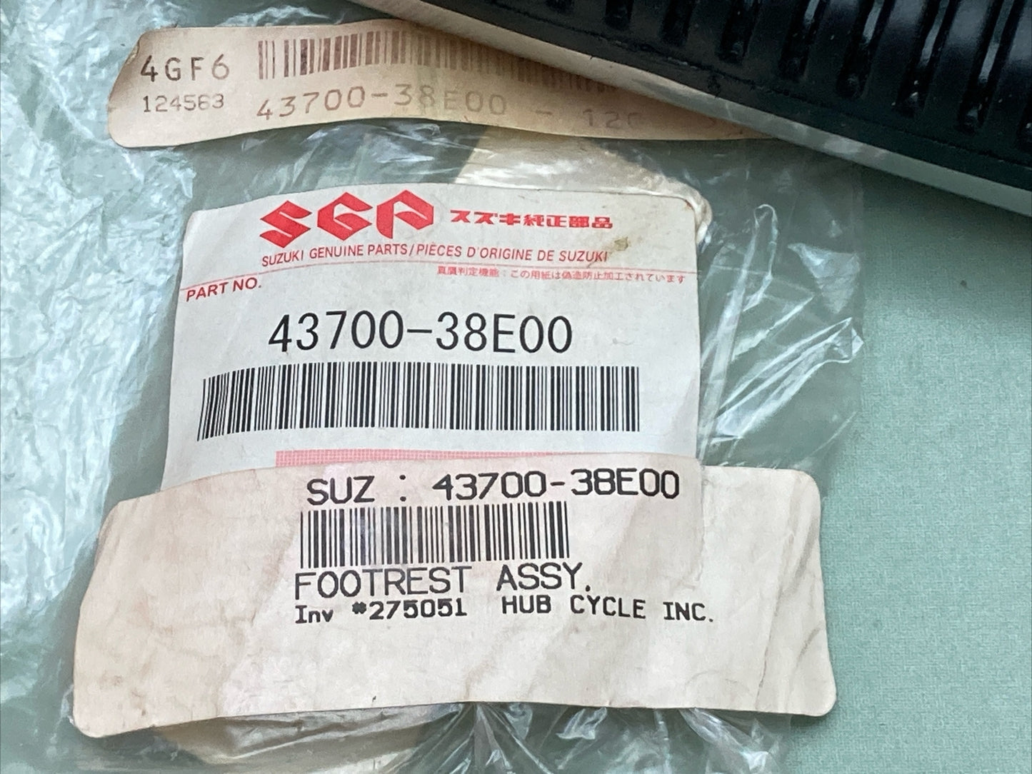 NEW GENUINE SUZUKI 43700-38E00 FOOTREST ASSEMBLY, PILLION LH