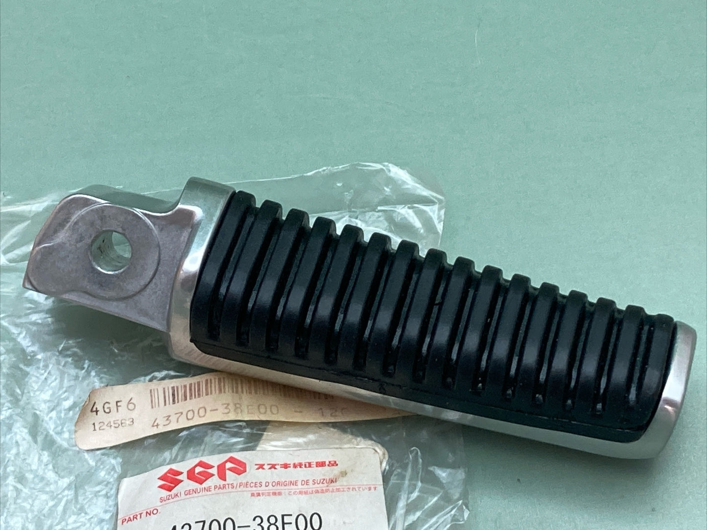 NEW GENUINE SUZUKI 43700-38E00 FOOTREST ASSEMBLY, PILLION LH