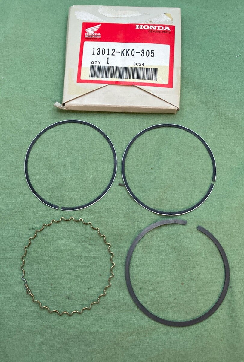 NEW GENUINE HONDA 13012-KK0-305 RING SET, PISTON (OVER SIZE) (0.25)