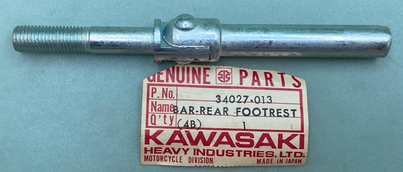 NEW GENUINE KAWASAKI 34027-013 FOOTREST BAR REAR