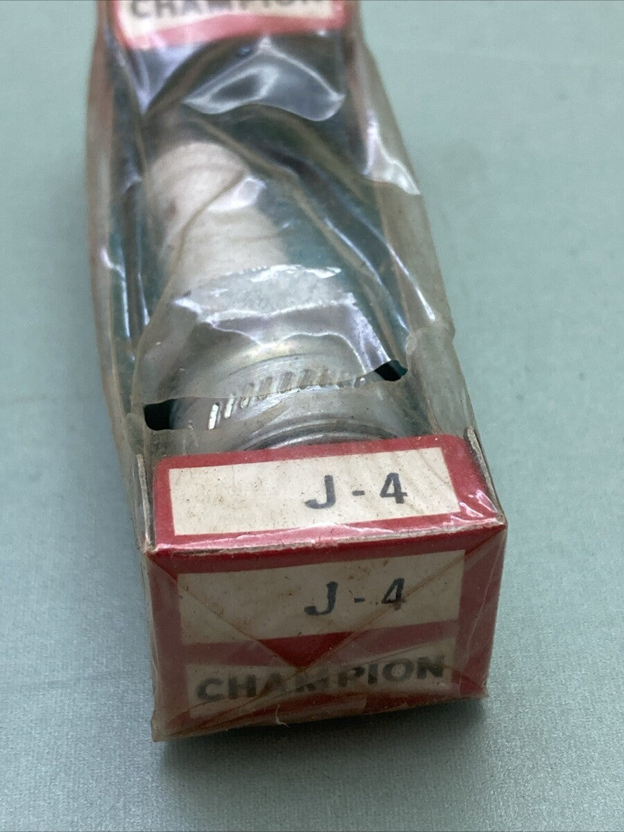 NEW GENUINE CHAMPION J-4 SPARK PLUG