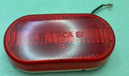 SIGNAL-STAT 77-557 RED OVAL LENS ASSEMBLY SAE PCA 81 94108