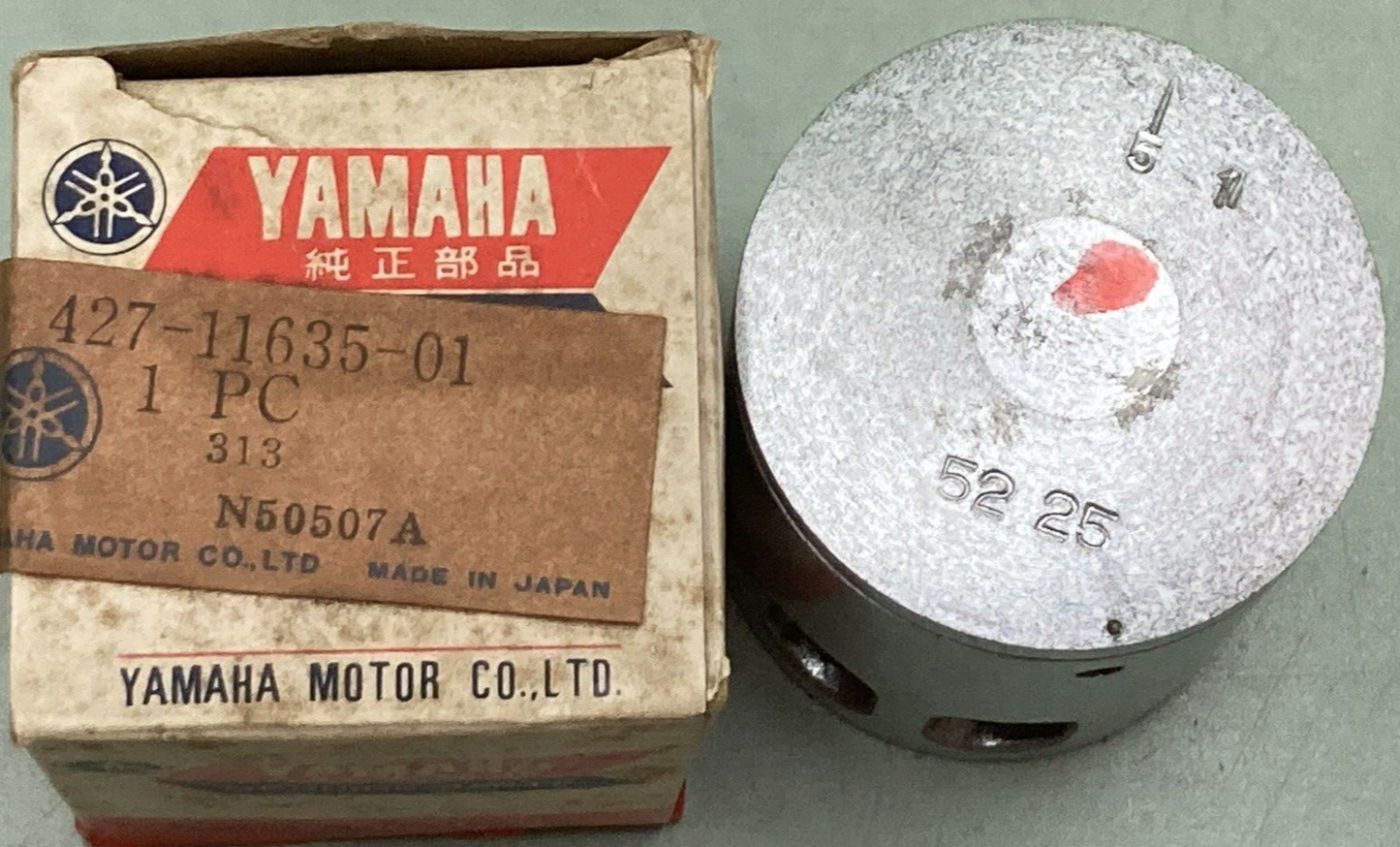NEW GENUINE YAMAHA 427-11635-01 PISTON 1ST 0.25 O/S