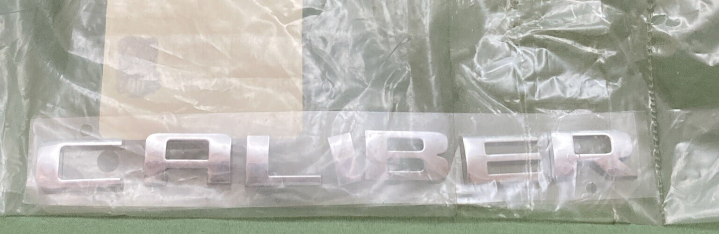 NEW GENUINE MOPAR 05116022AA Caliber Nameplate 2007-2012 Dodge Caliber