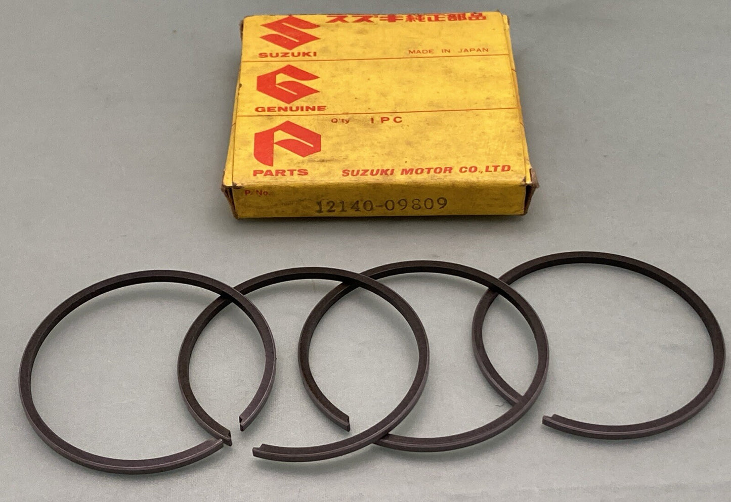 NEW GENUINE SUZUKI 12140-09809 PISTON RING SET, 1968 SUZUKI 150 S32-2