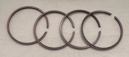 NEW GENUINE SUZUKI 12140-11012 PISTON RING SET, 1969 SUZUKI T20 TC250