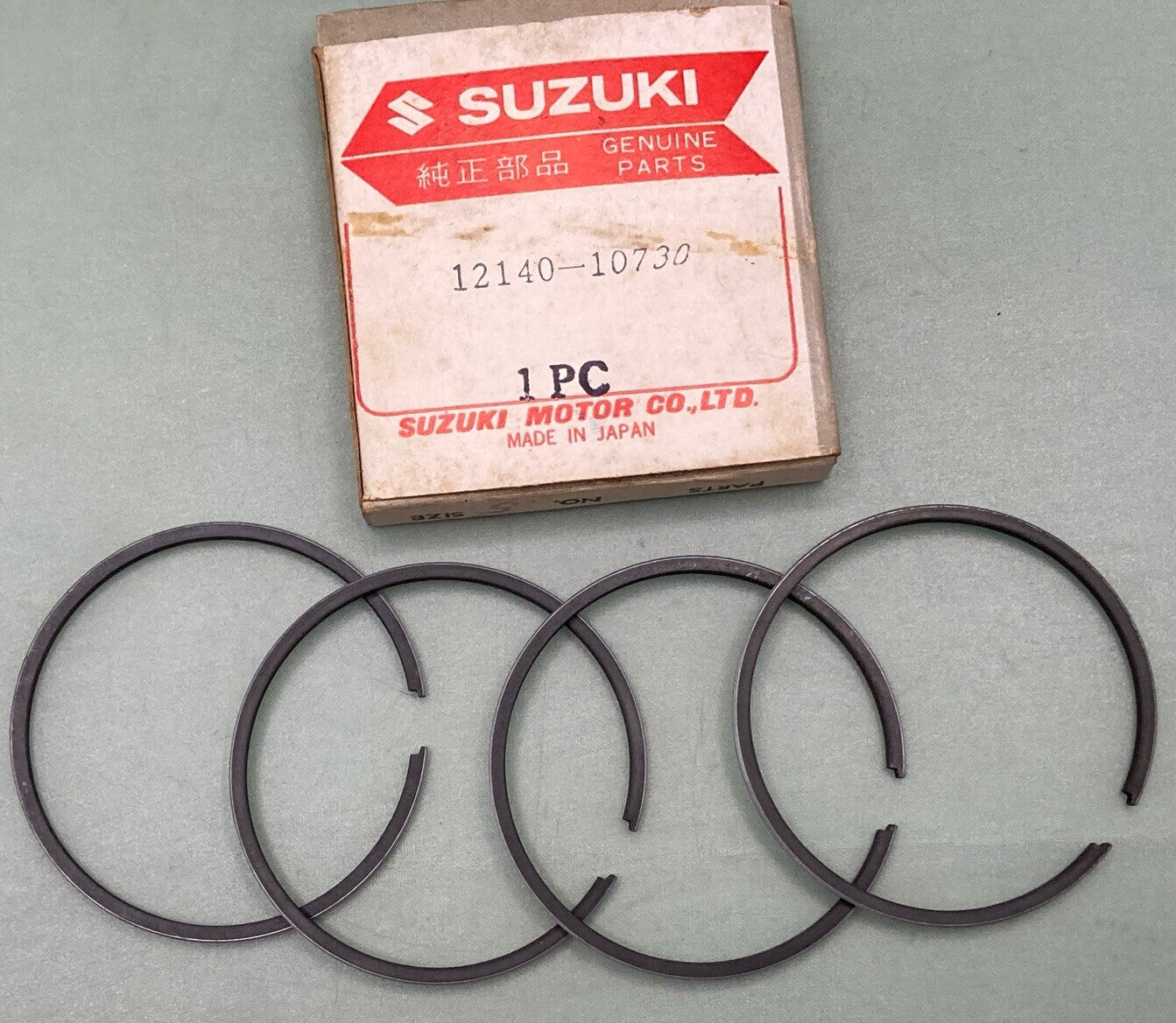 QTY 2 NEW GENUINE SUZUKI 12140-10730 PISTON RING SET, 1968 SUZUKI T200 TC200